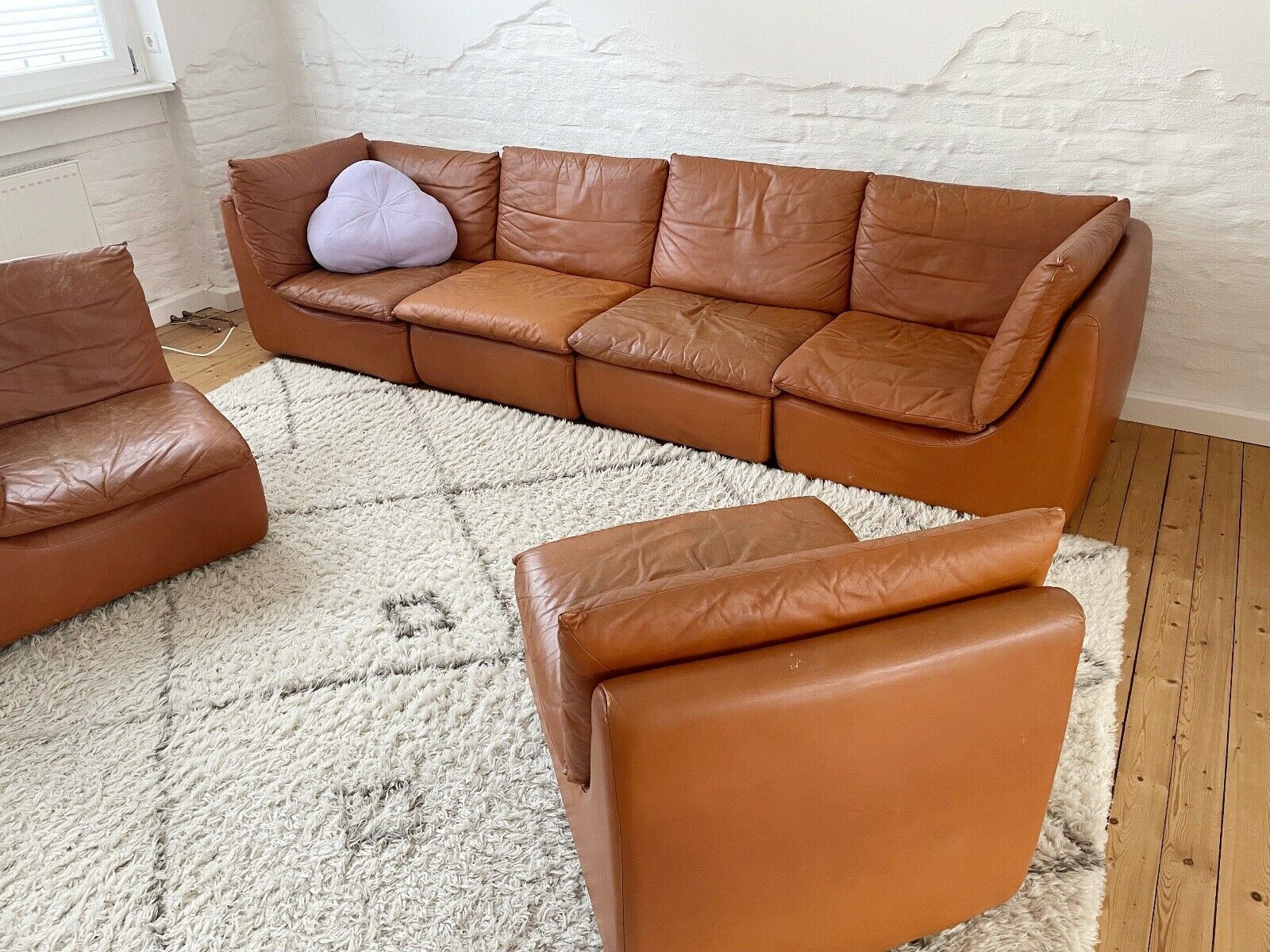 modular sofa of the 70s in tawny leather