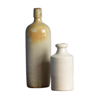 Old kettle and sandstone vase