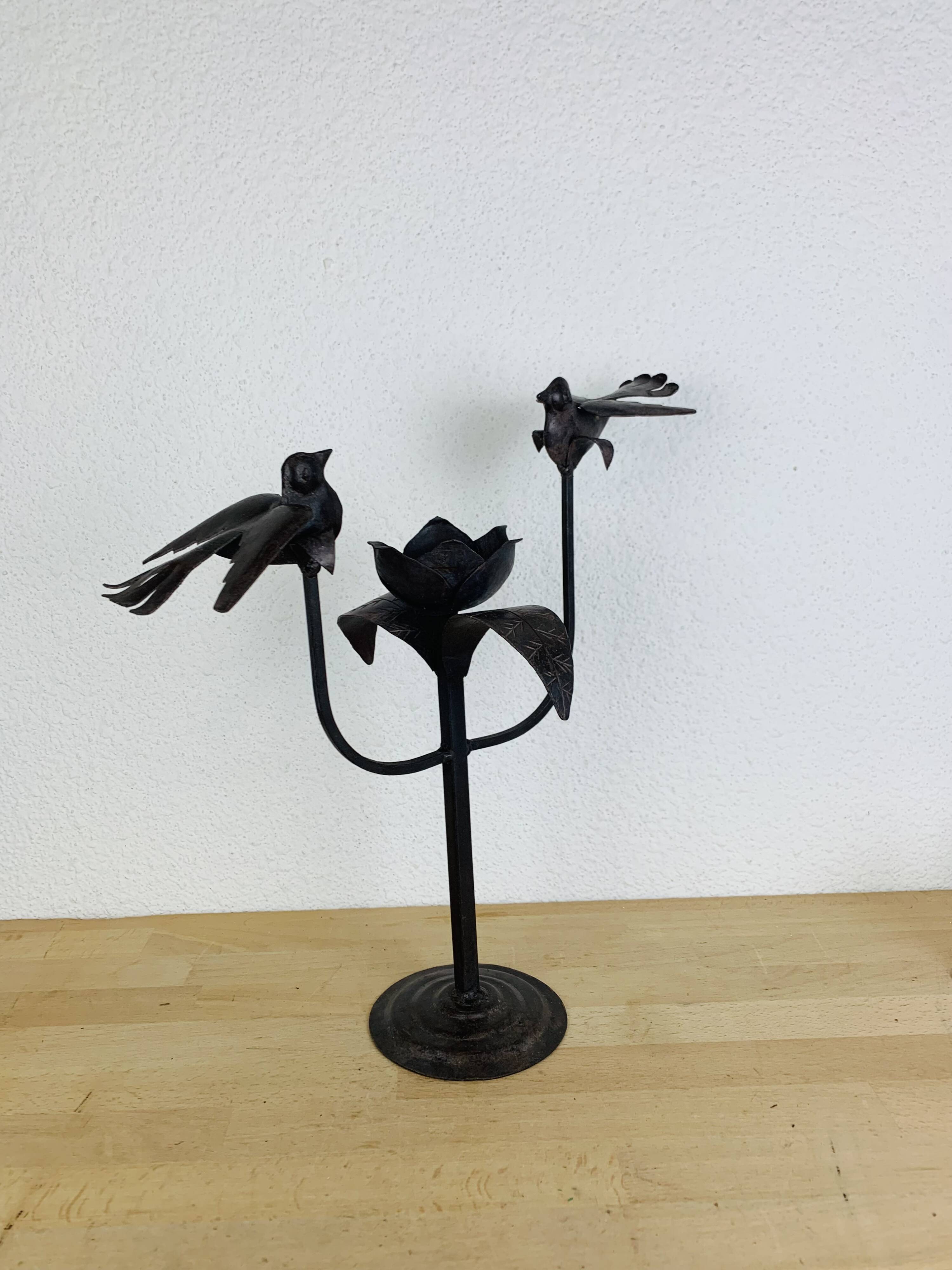 Brutalist wrought iron candle holder with birds