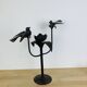 Brutalist wrought iron candle holder with birds