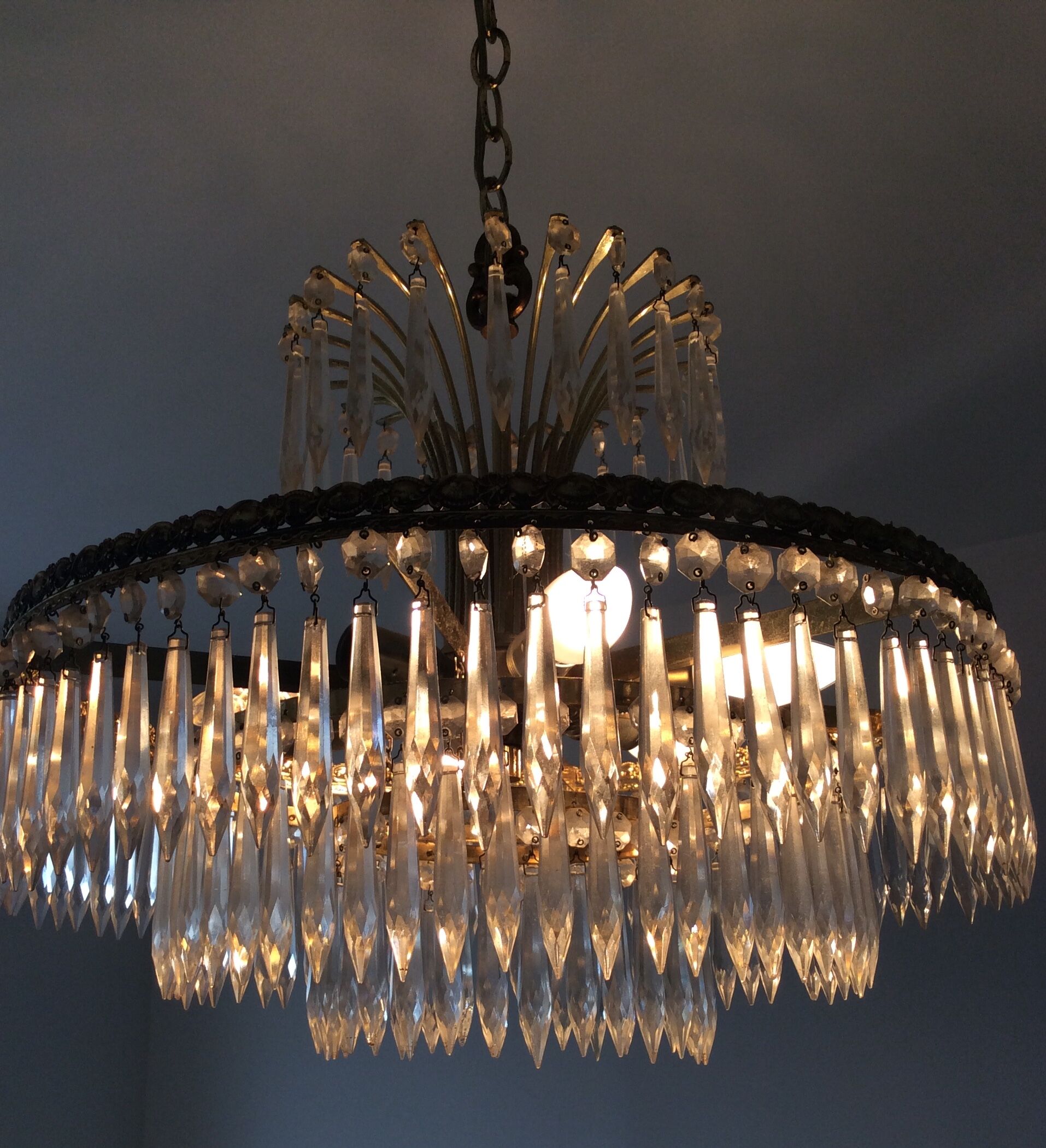 Old waterfall chandelier with grapevines and bronze