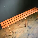 Old orange metal bench