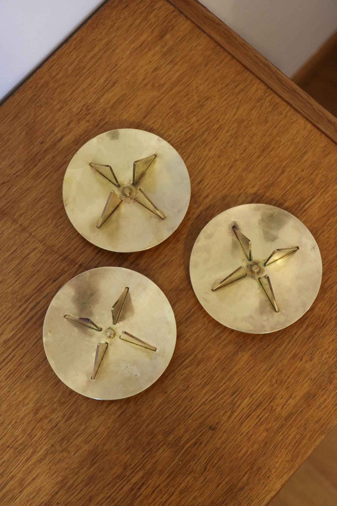 Scandinavian trio of candlesticks in brass by Pierre Forsell for Skultuna.