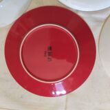 Set of four retro dessert plates in shades of red