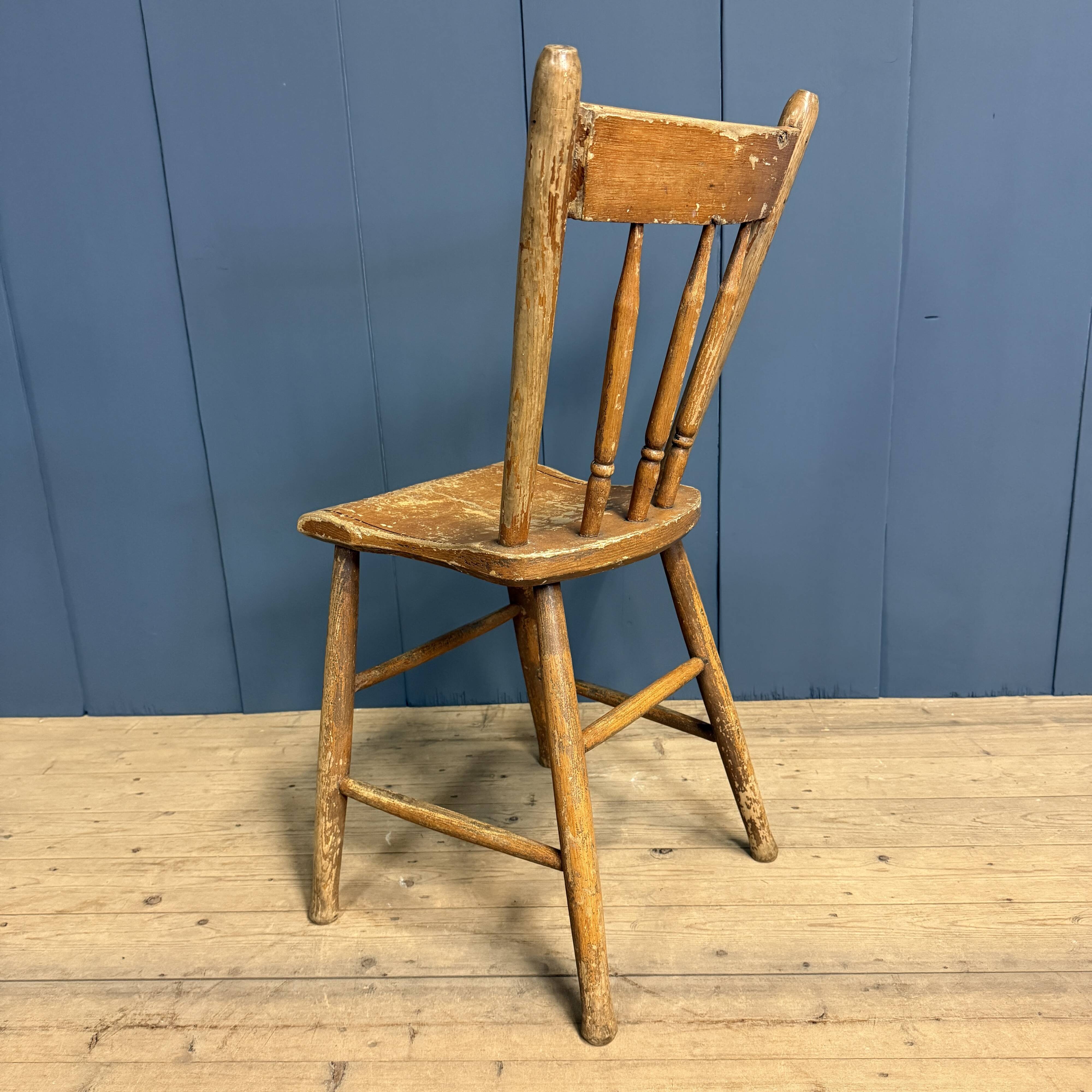 Set of four painted Dutch kitchen chairs.