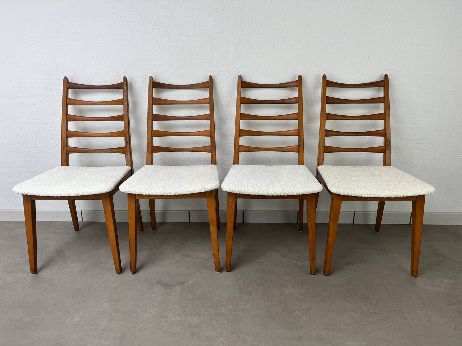 4 Scandinavian chairs, teak with boucle seats.
