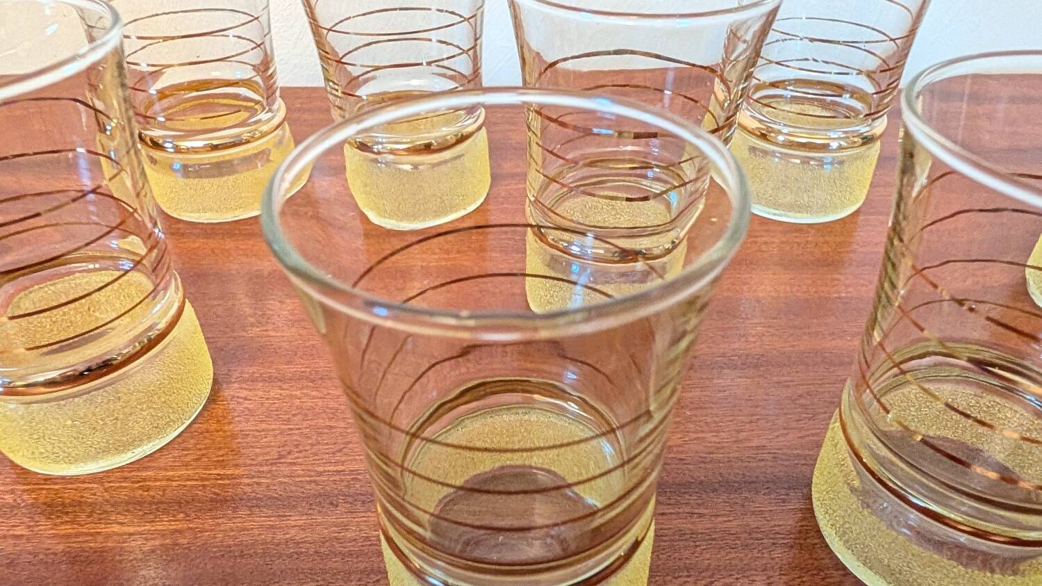 70s vintage glass with gold decoration and a speckled base.
