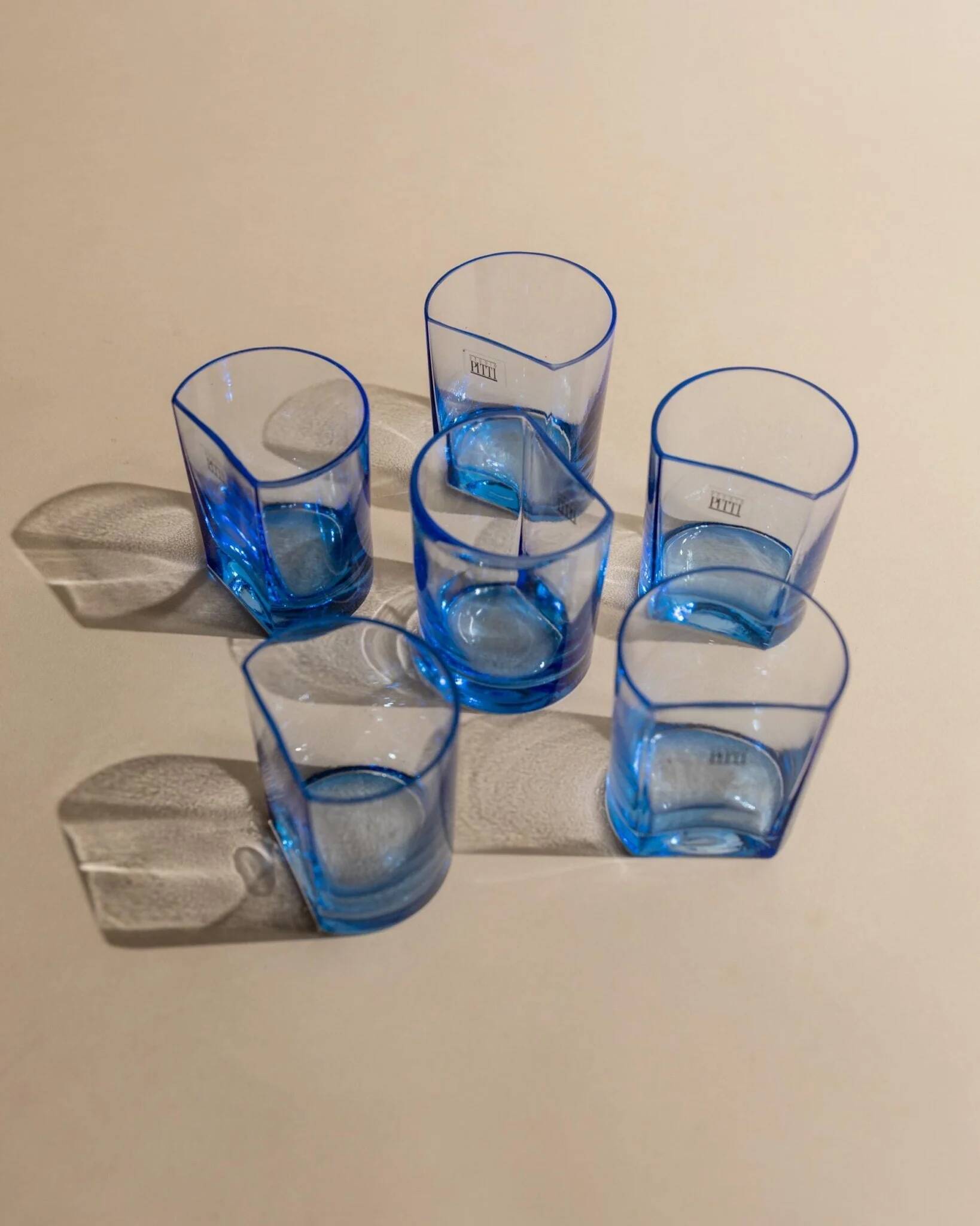Set of 6 vintage blue drinking glasses with curved design, Pitti Studio, Italy, 1980s.