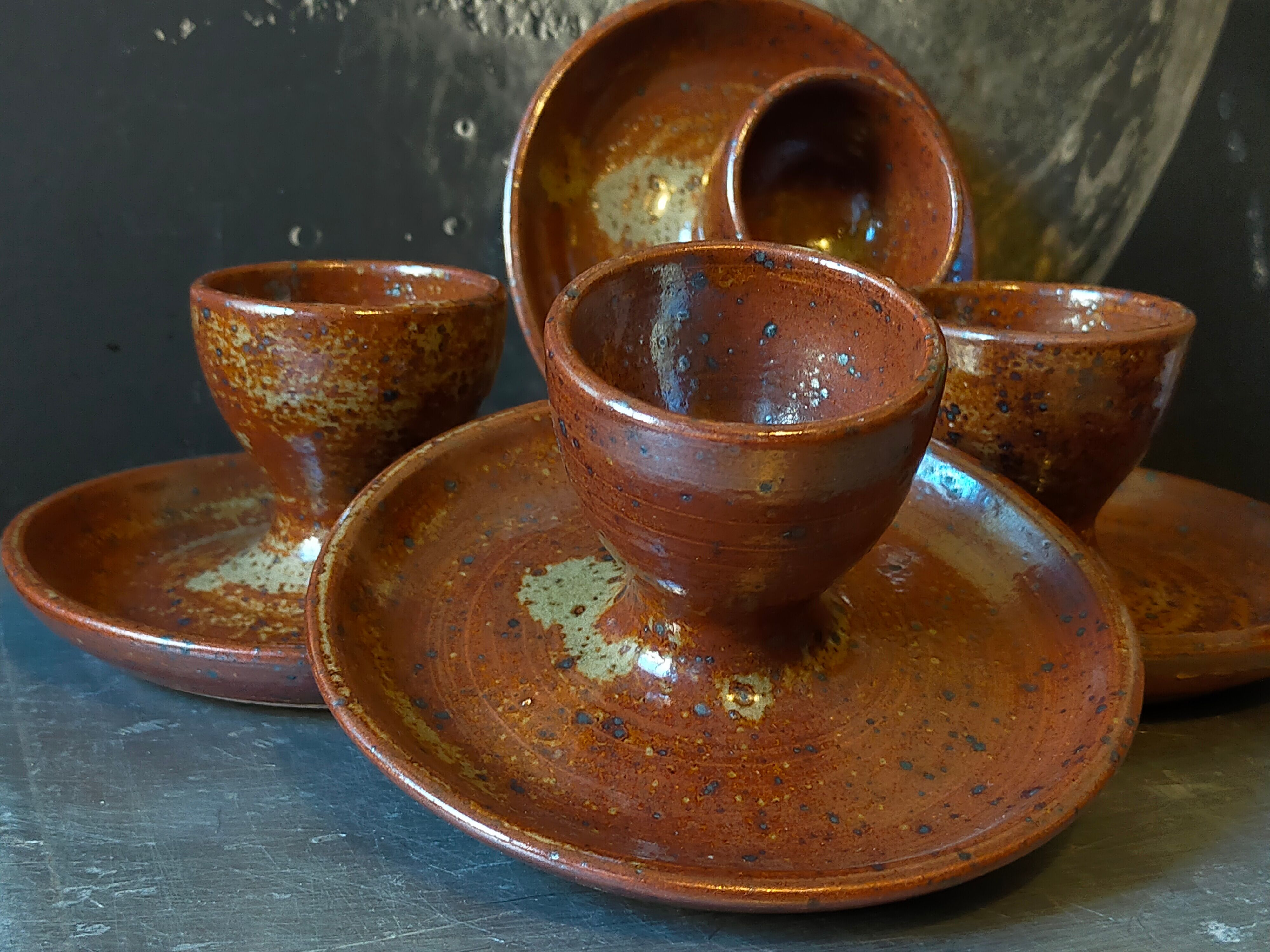 Four pyrite stoneware shells