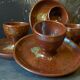 Four pyrite stoneware shells