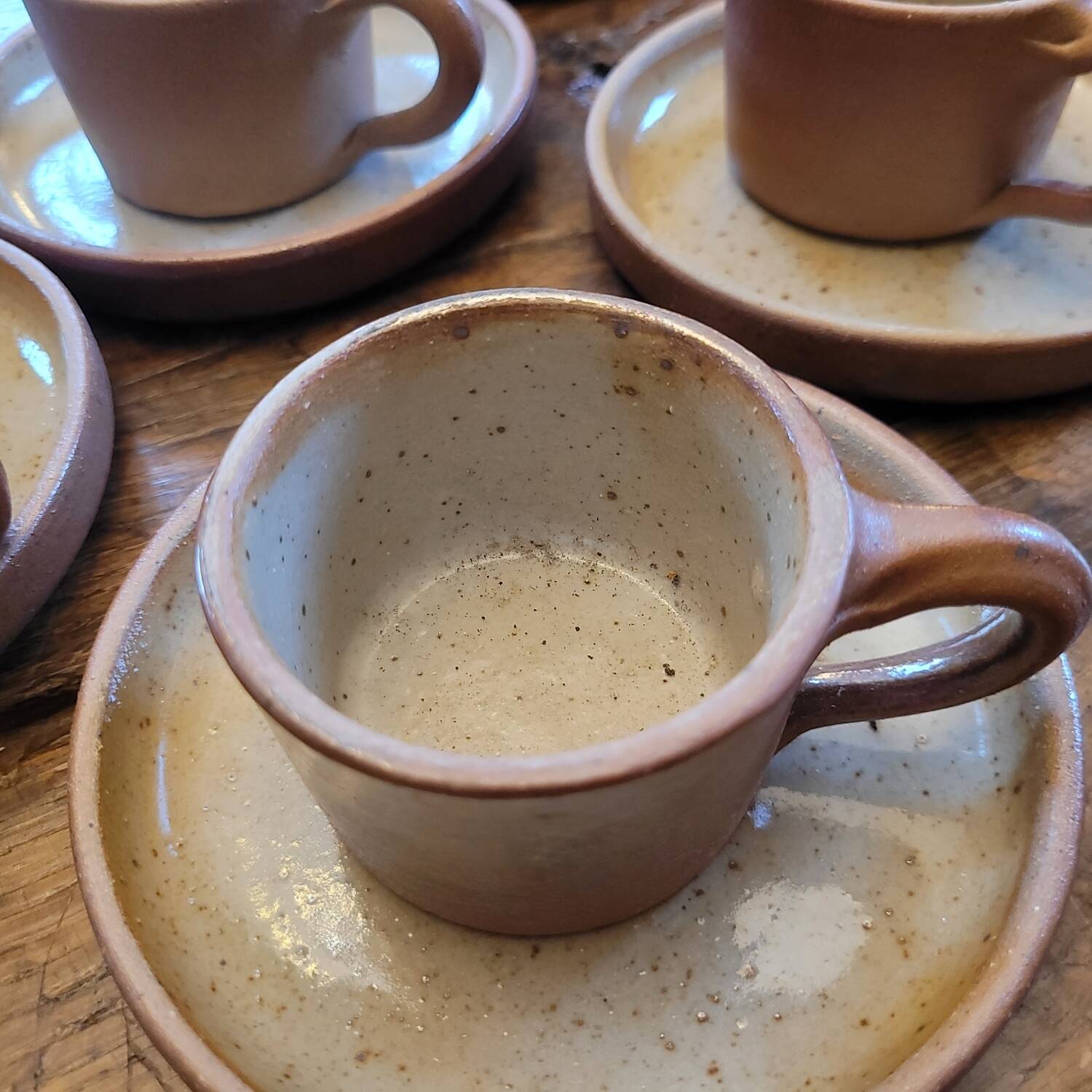 Service of 5 cups and saucers in brown stoneware – 1970s–1980s