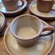 Service of 5 cups and saucers in brown stoneware – 1970s–1980s