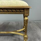 Antique gilded wooden bench in Louis XVI style, 19th century.