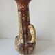 Antique Kabyle Algerian pottery vase with handle and polychrome geometric decorations