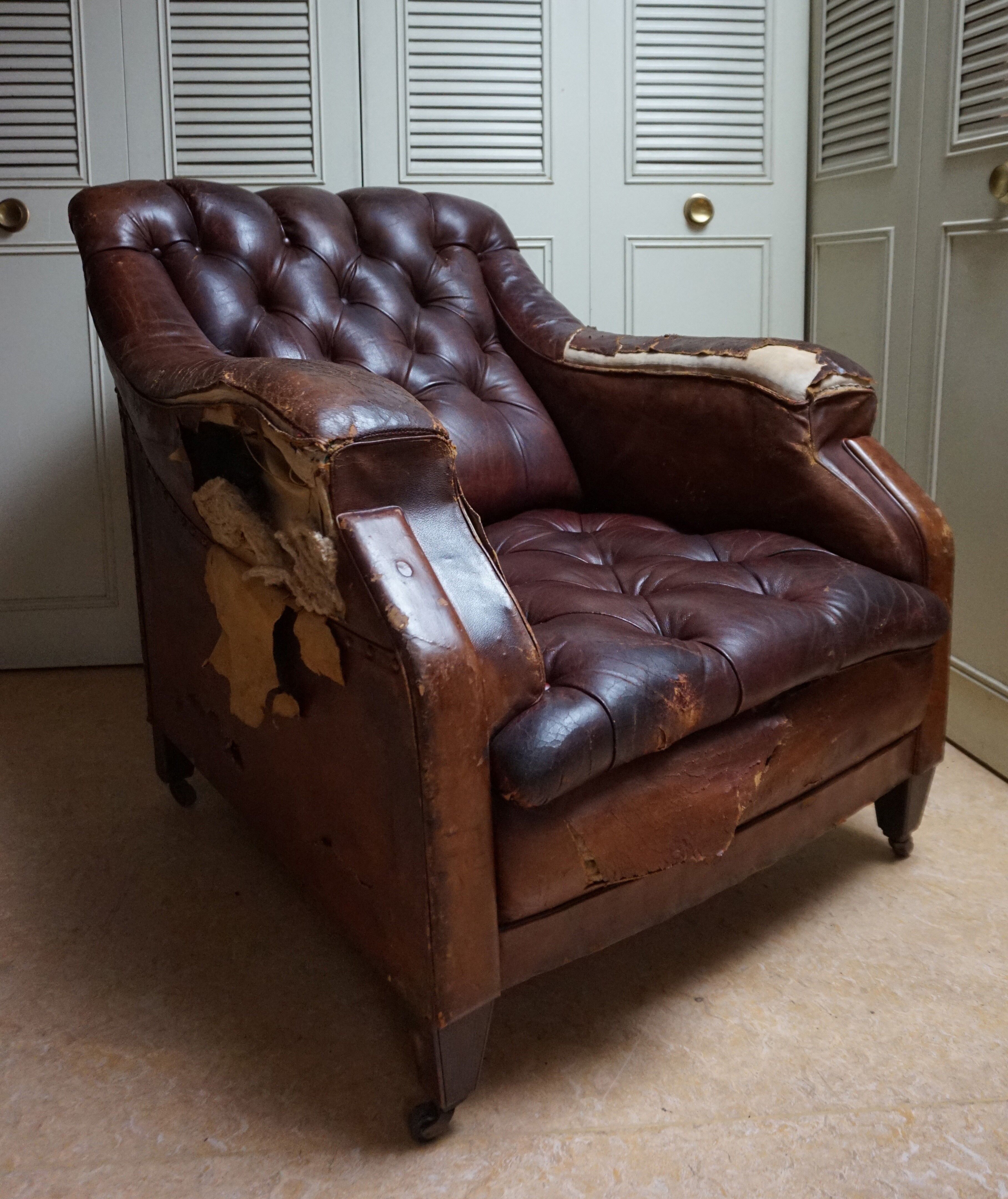 Worn Leather Buttoned Library Fireside Armchair, 1840's