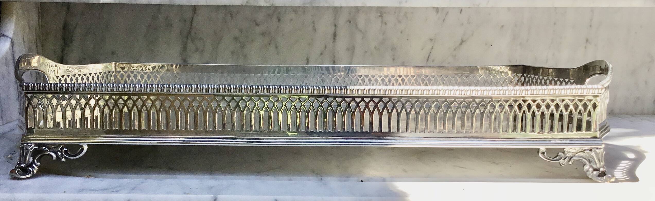 Important silver-plated metal table in the Louis XVI style.
