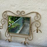 Wall-mounted gilded wrought iron coat rack with mirror