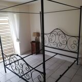 Four-poster bed