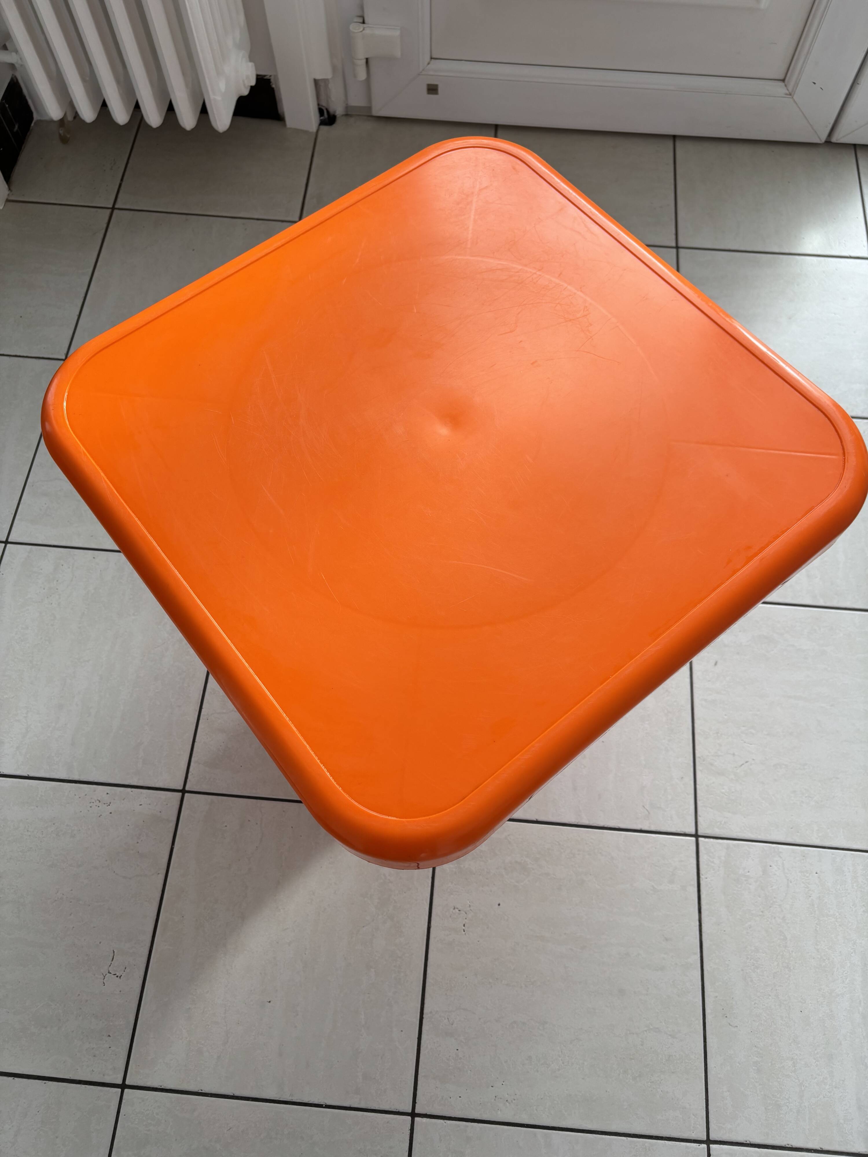 Orange plastic coffee table S.e.l.a.p.