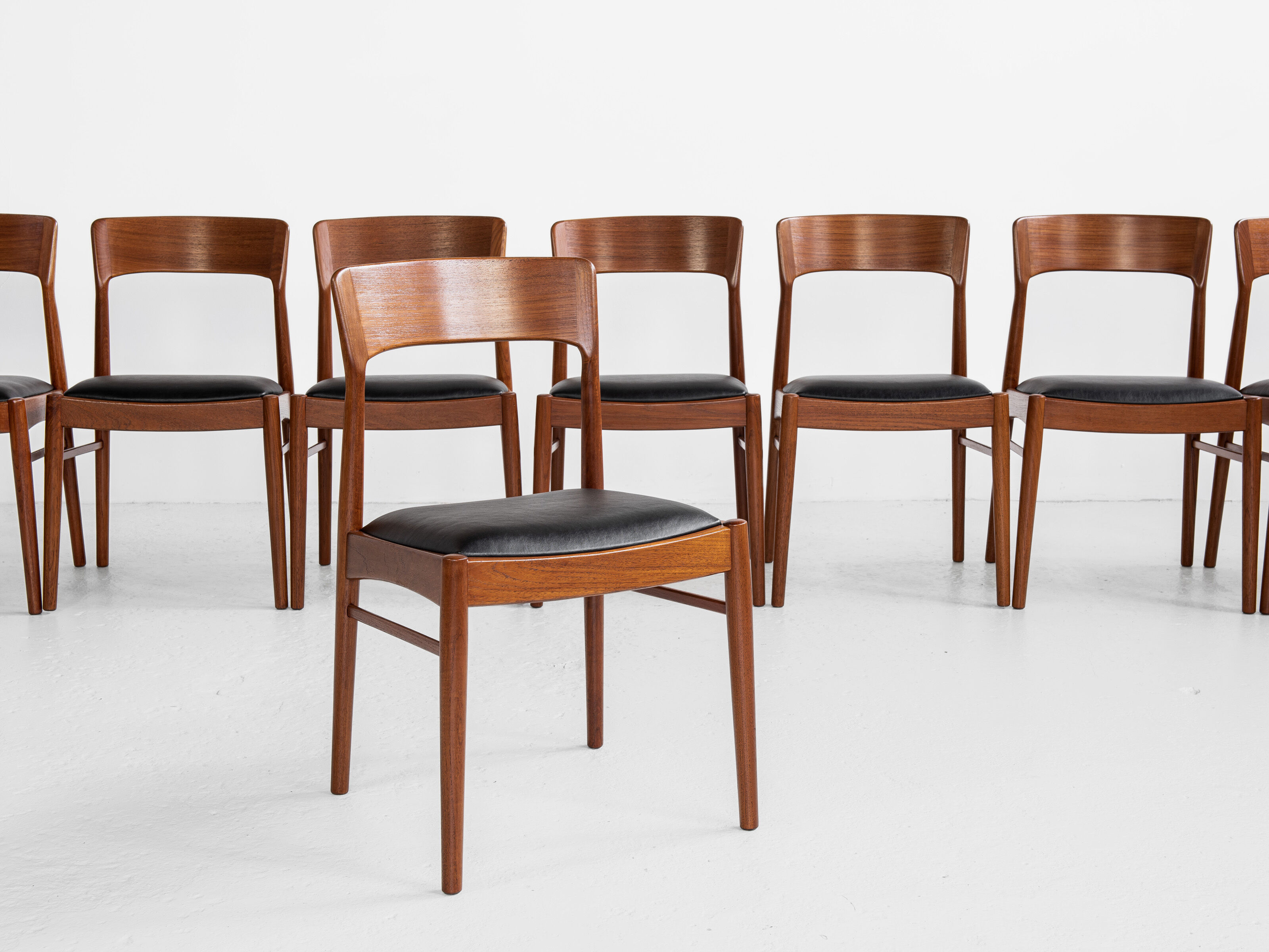 Midcentury Danish set of 8 dining chairs in teak by Henning Kjaernulf for Korup Stolefabrik