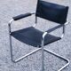 Fauteuil style MG5 tubes chromés assise et dossier cuir noir