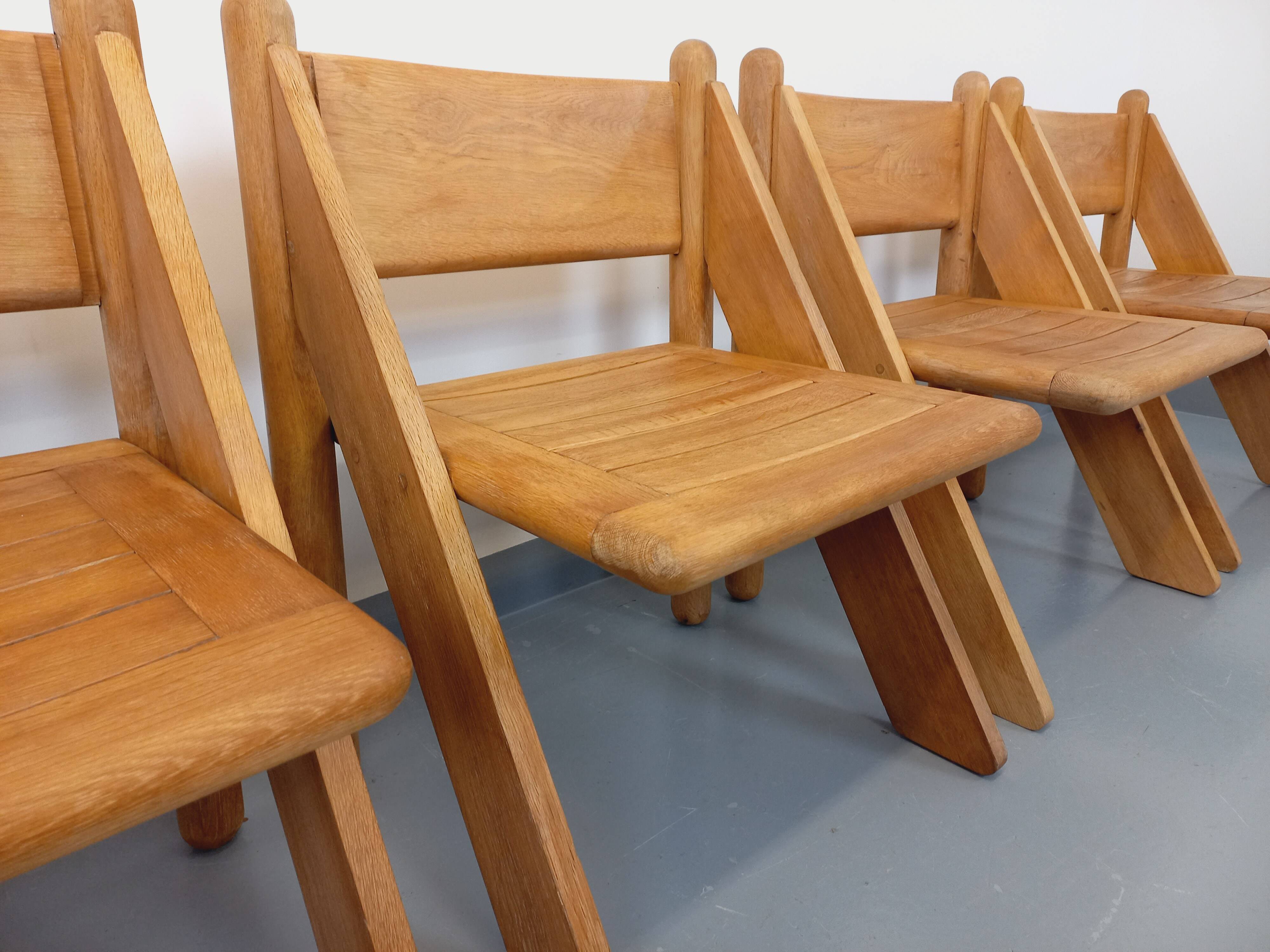 Set of 4 vintage brutalist chairs in solid oak from the 1960s.