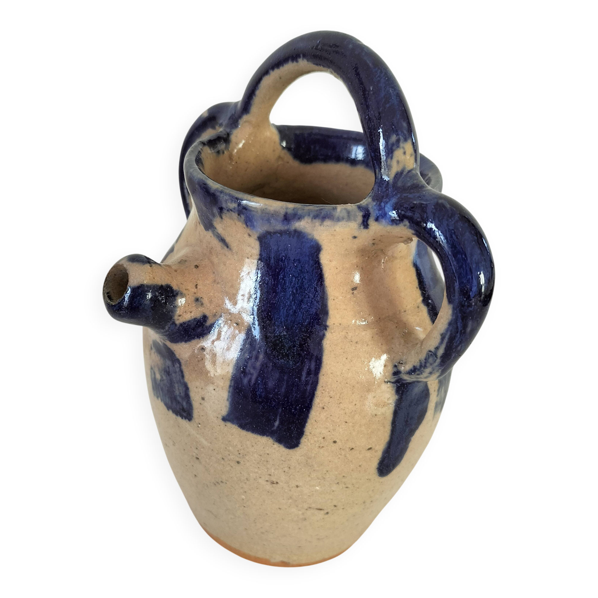 Old pitcher (goat) in cobalt glazed earthenware