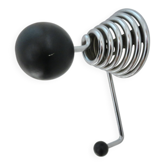 "Streamline" wall coat rack in chromed metal and black lacquered wood, 1970.