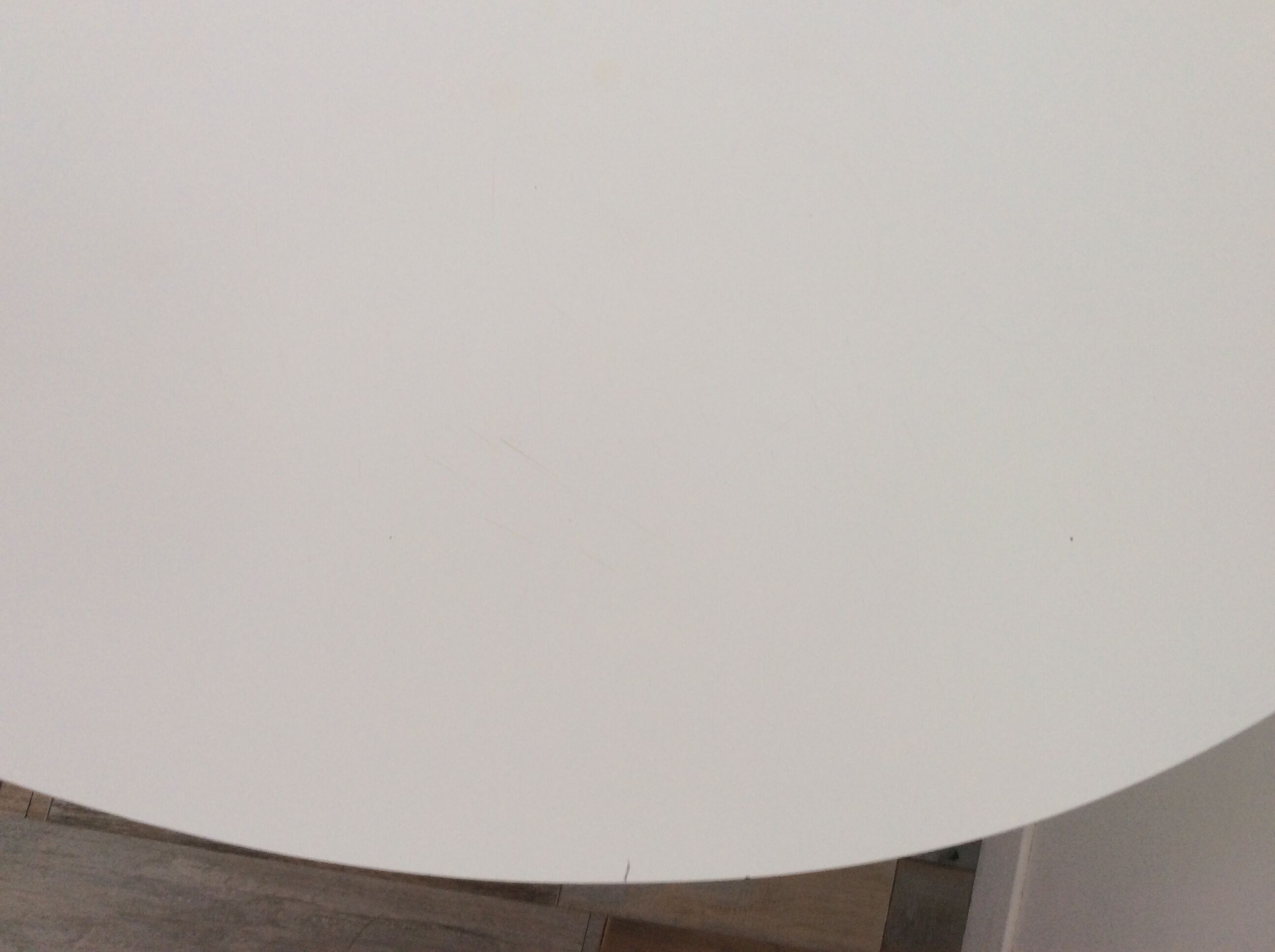 Round dining table of the 70s