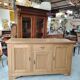 Low sideboard in light solid oak with 3 doors and 1 drawer.