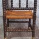 Fireplace corner chair in Louis XIII style, turned wood with braided rush, 19th century.