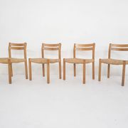 Set of four oak and sisal dining chairs model 401 by JL Moller, Denmark 1970's
