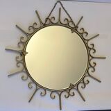 Miroir soleil en métal doré