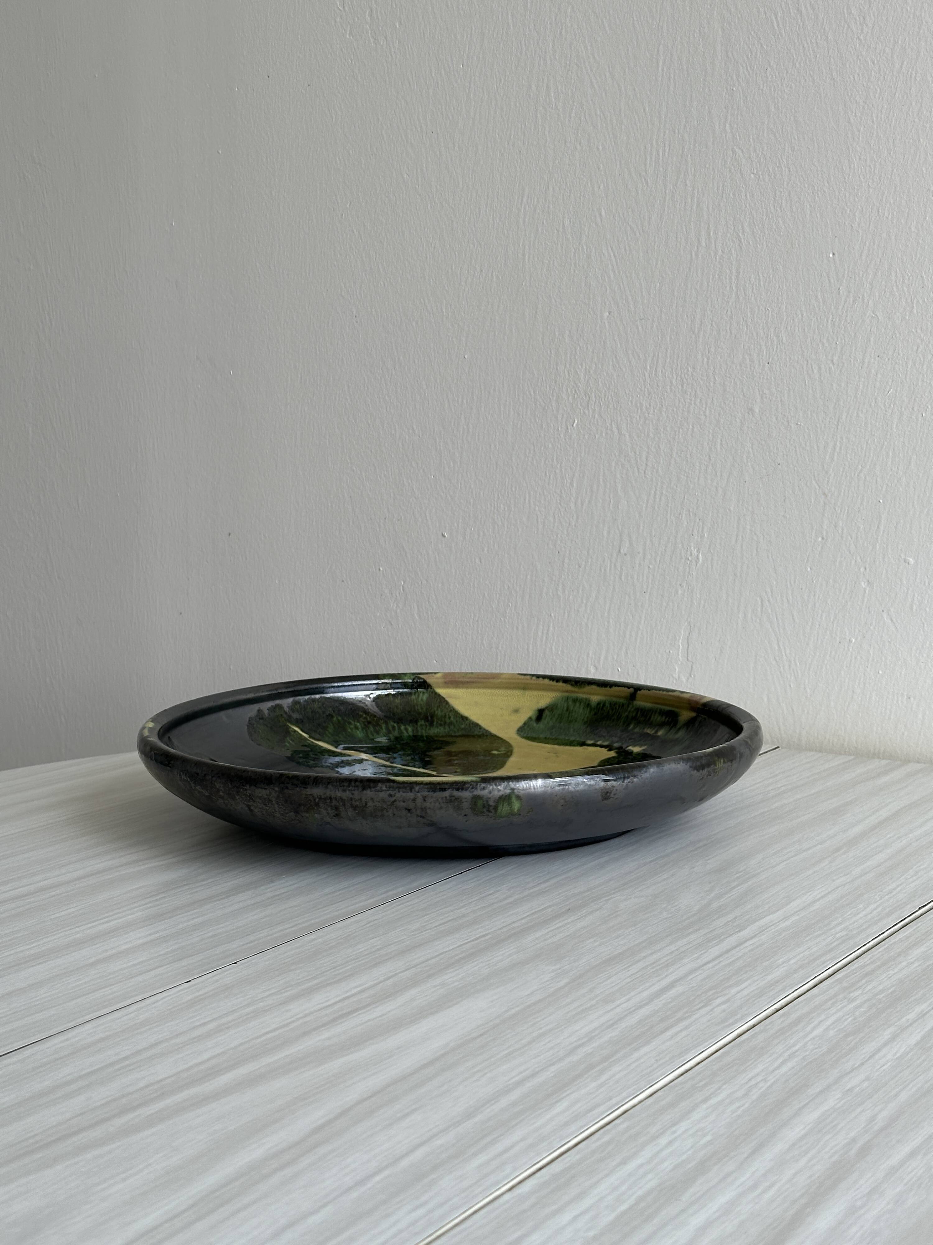 large colored terracotta ceramic dish