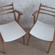 Pair of 1950s compass leg armchairs.