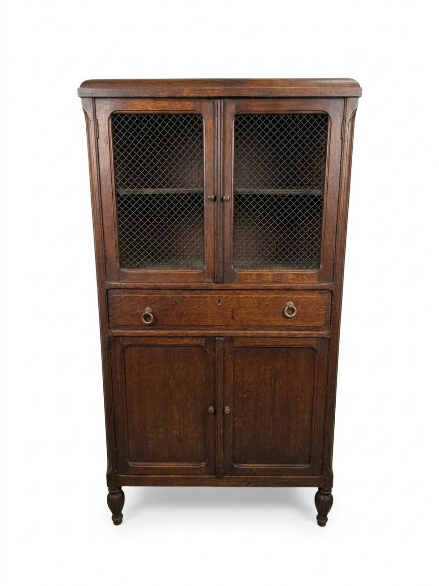 Vintage oak furniture with mesh doors.