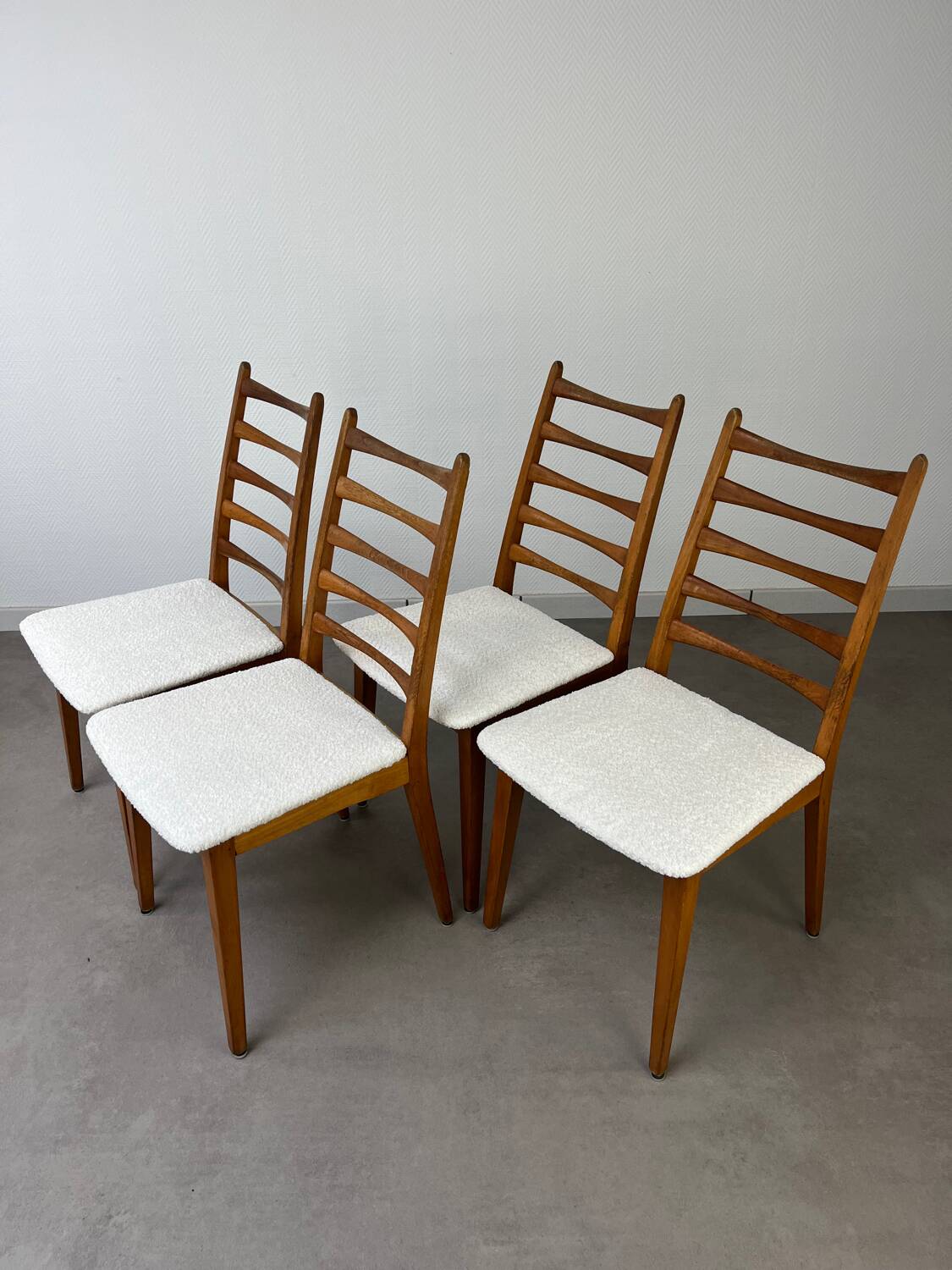 4 Scandinavian chairs, teak with boucle seats.