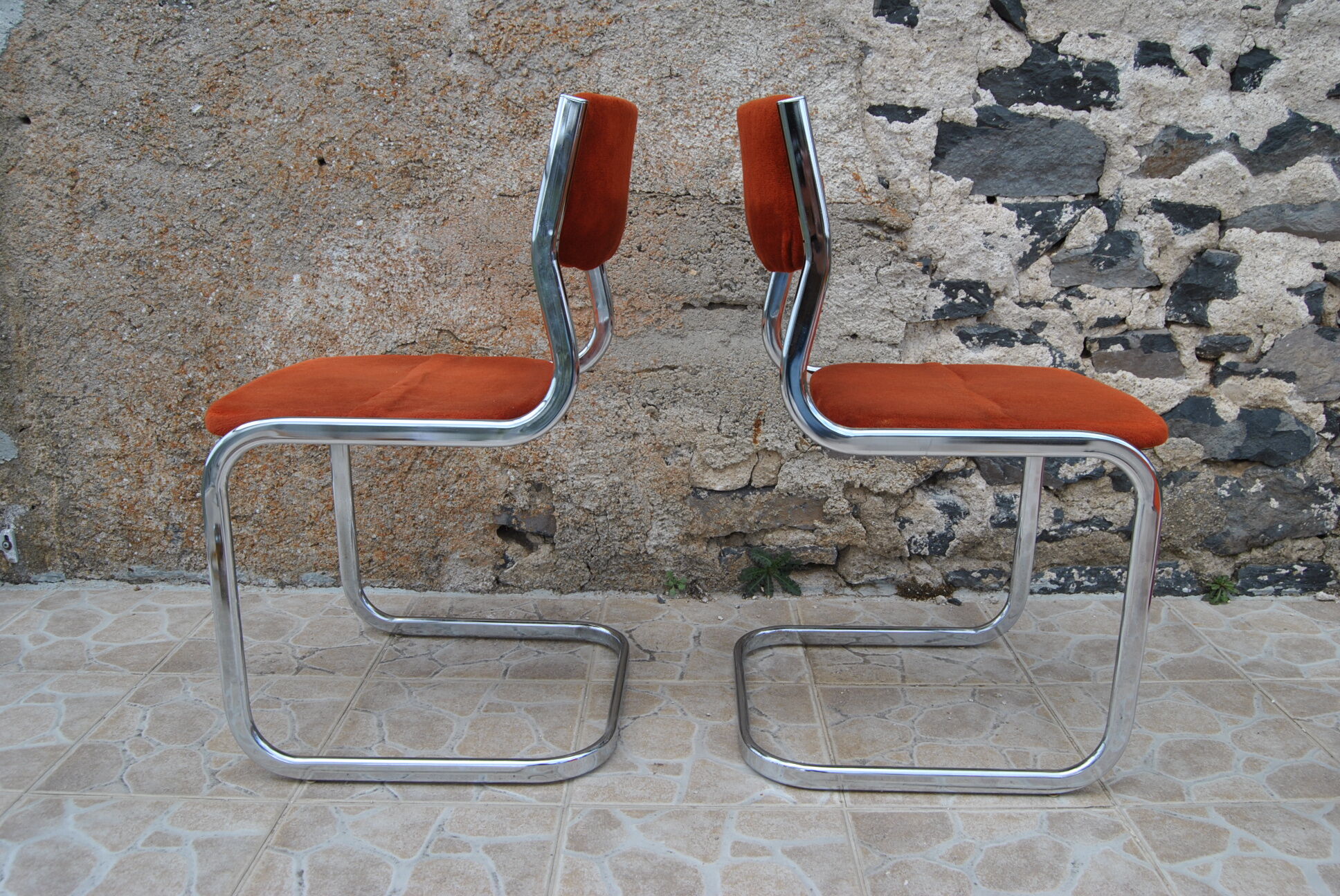 Pair of orange velvet chairs Roche Bobois 70s
