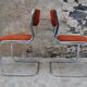 Pair of orange velvet chairs Roche Bobois 70s