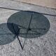 Table rond en métal chromé dessus verre fumé des années 70