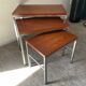 Trio of teak and chrome metal nesting tables from the 60s-70s