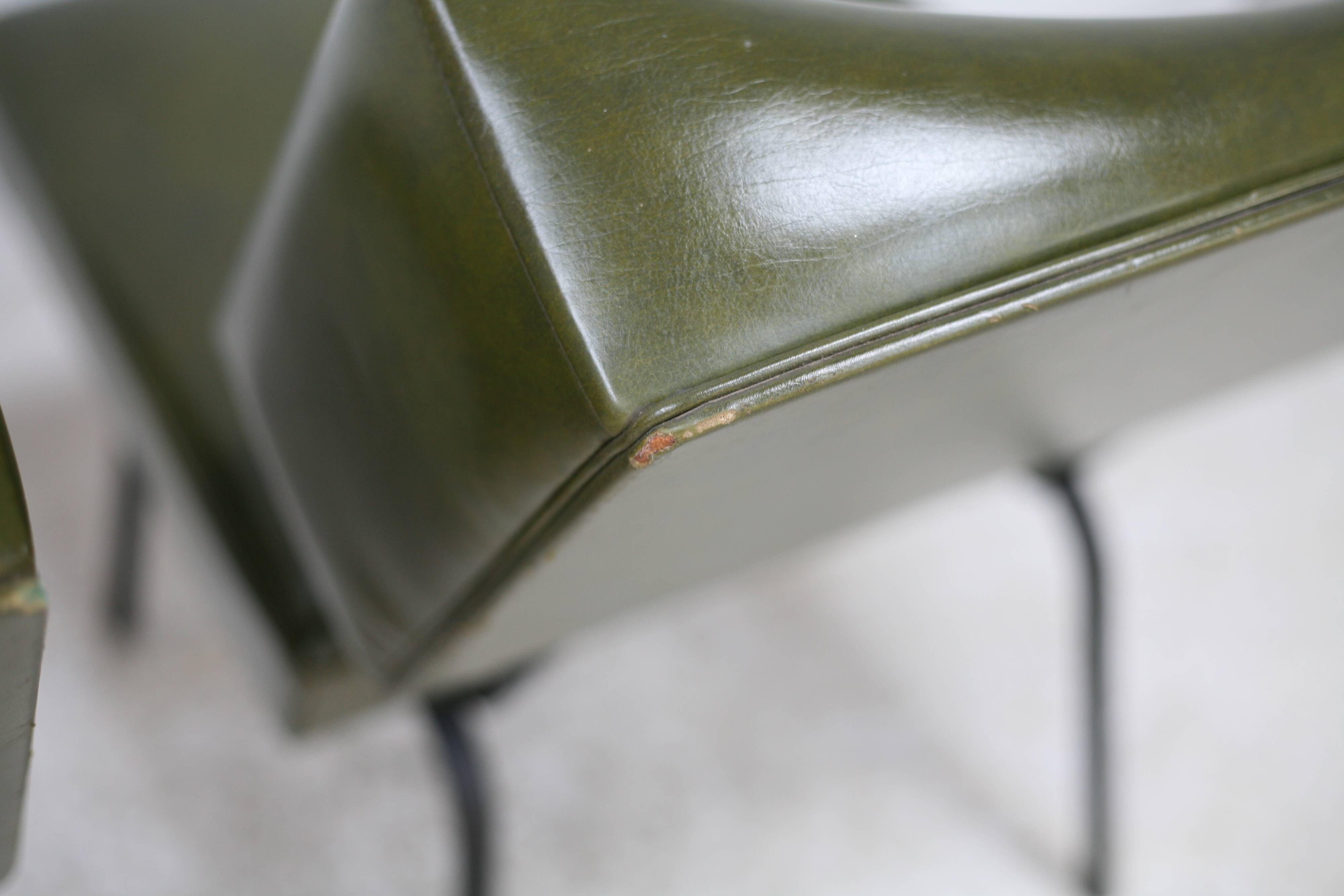 Pair of tubular armchairs, imitation leather. Circa 1950