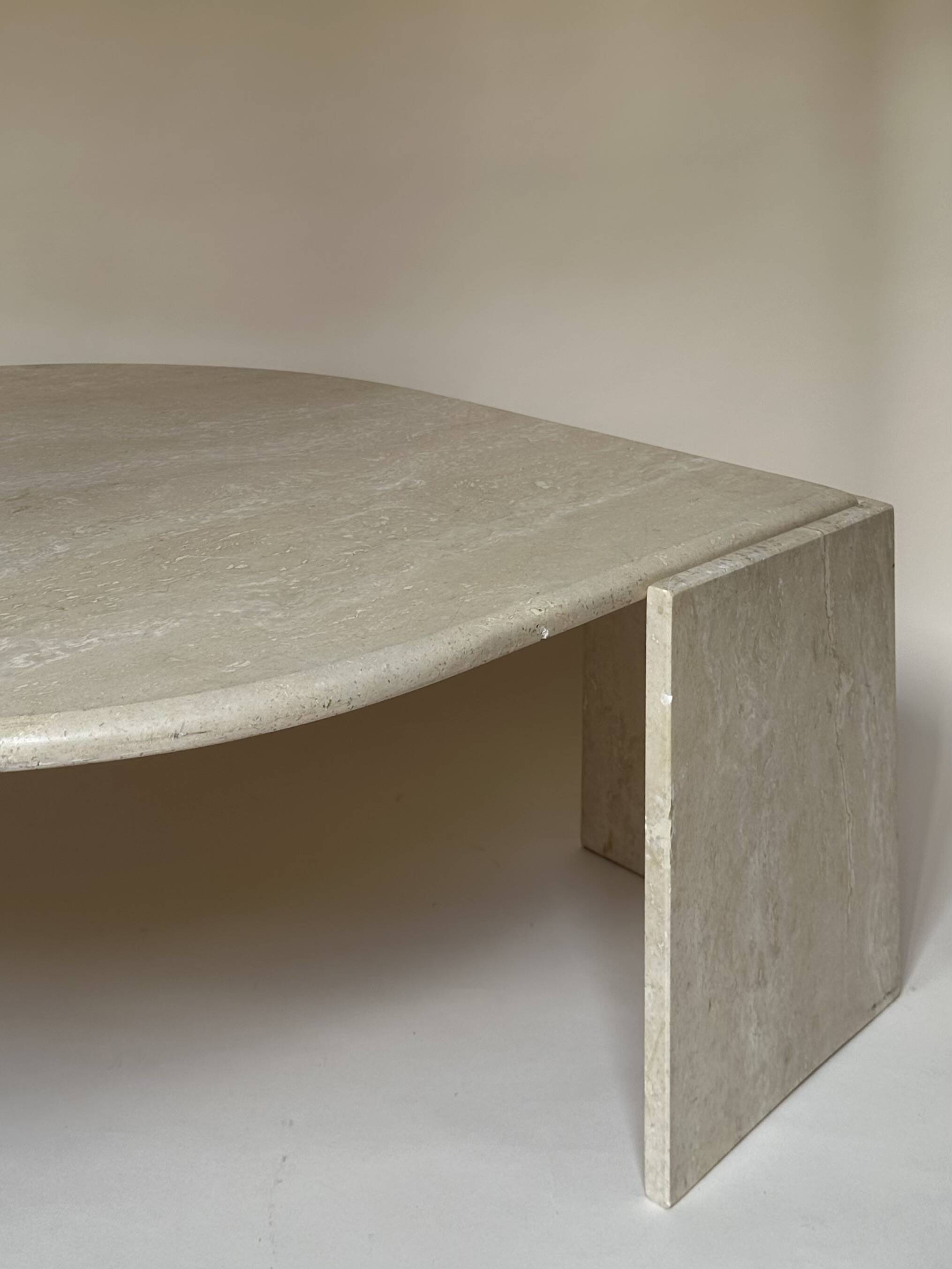 Travertine eye-shaped coffee table