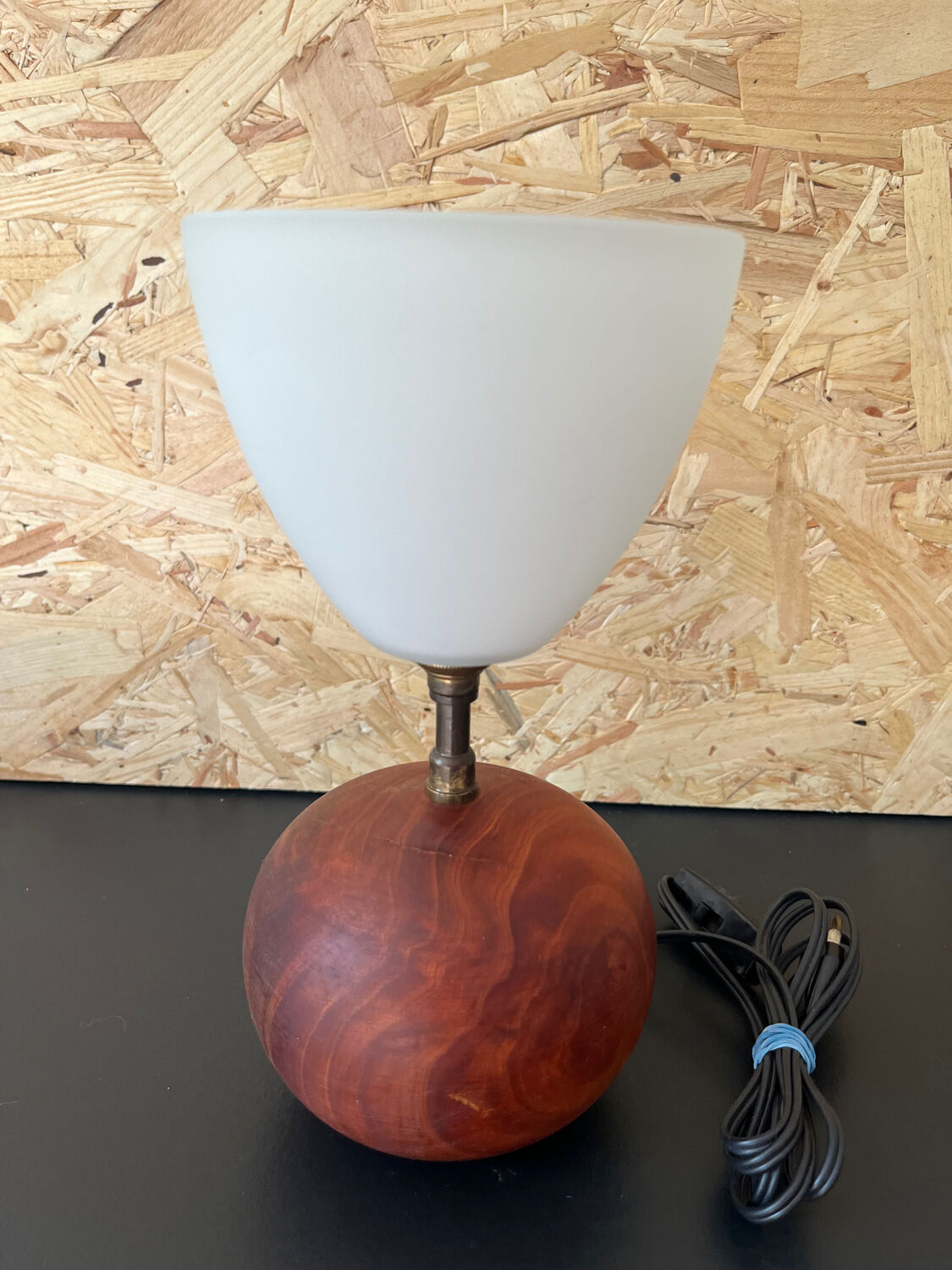 Small model wooden ball lamp with molded glass tulip