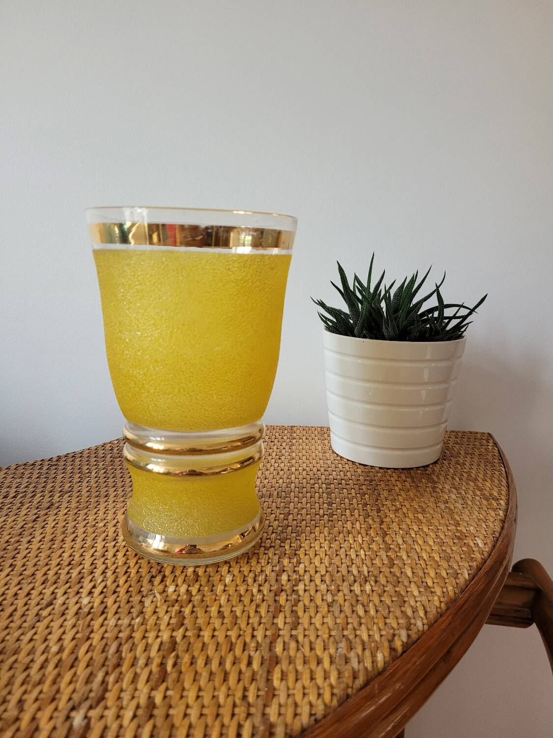 Yellow and gold granite vase