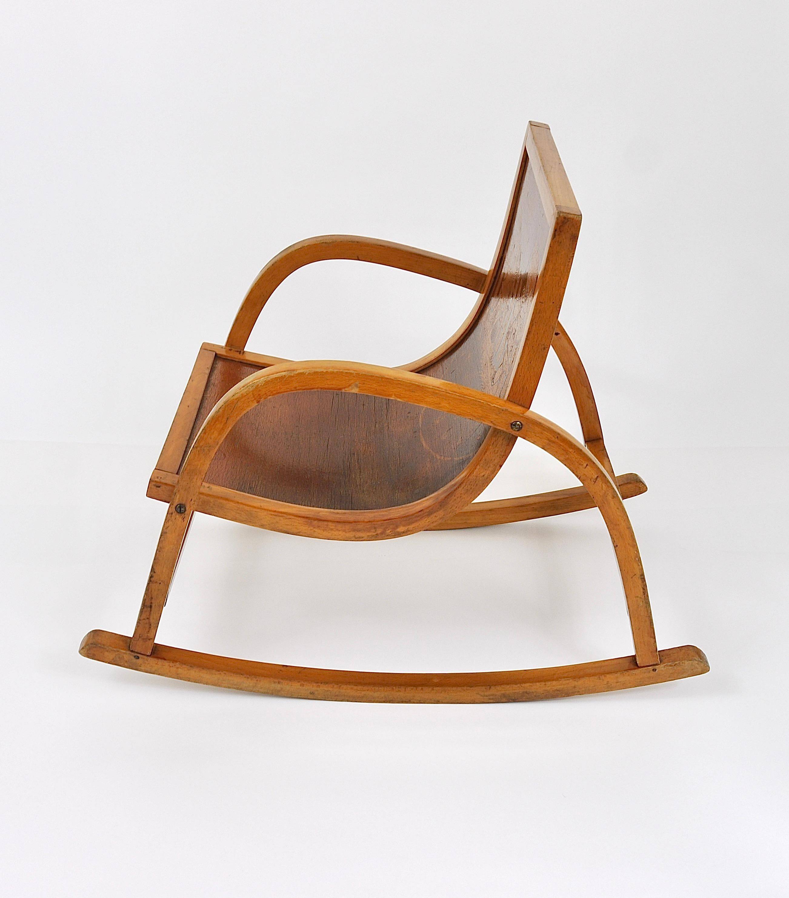Curved wooden rocking chair for children Bauhaus Brockhage Andrä period, Germany, 1950s