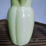 Yellow pitcher in earthenware