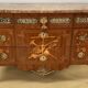 Transition chest of drawers with floral marquetry and music trophy