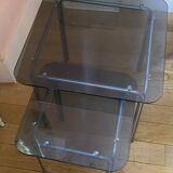 pair of smoked glass nesting tables