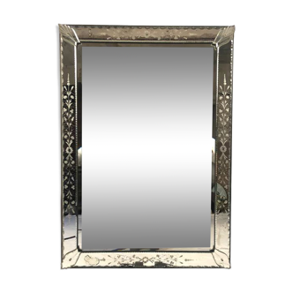 Mirror of Venice with decoration engraved with flowers